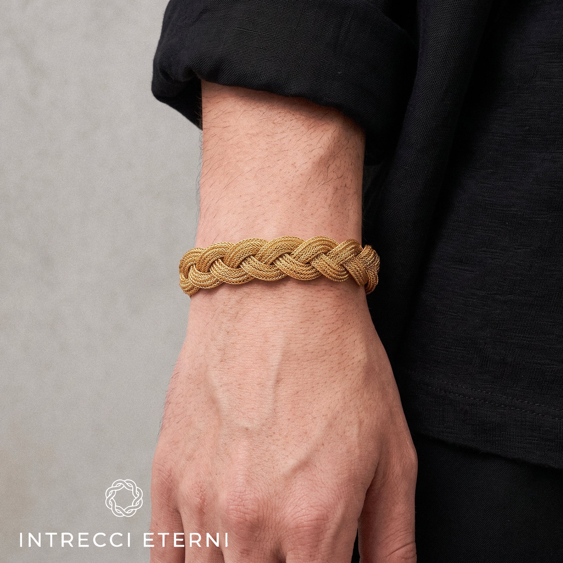 BRACCIALE INTRECCIO TITANO GOLD